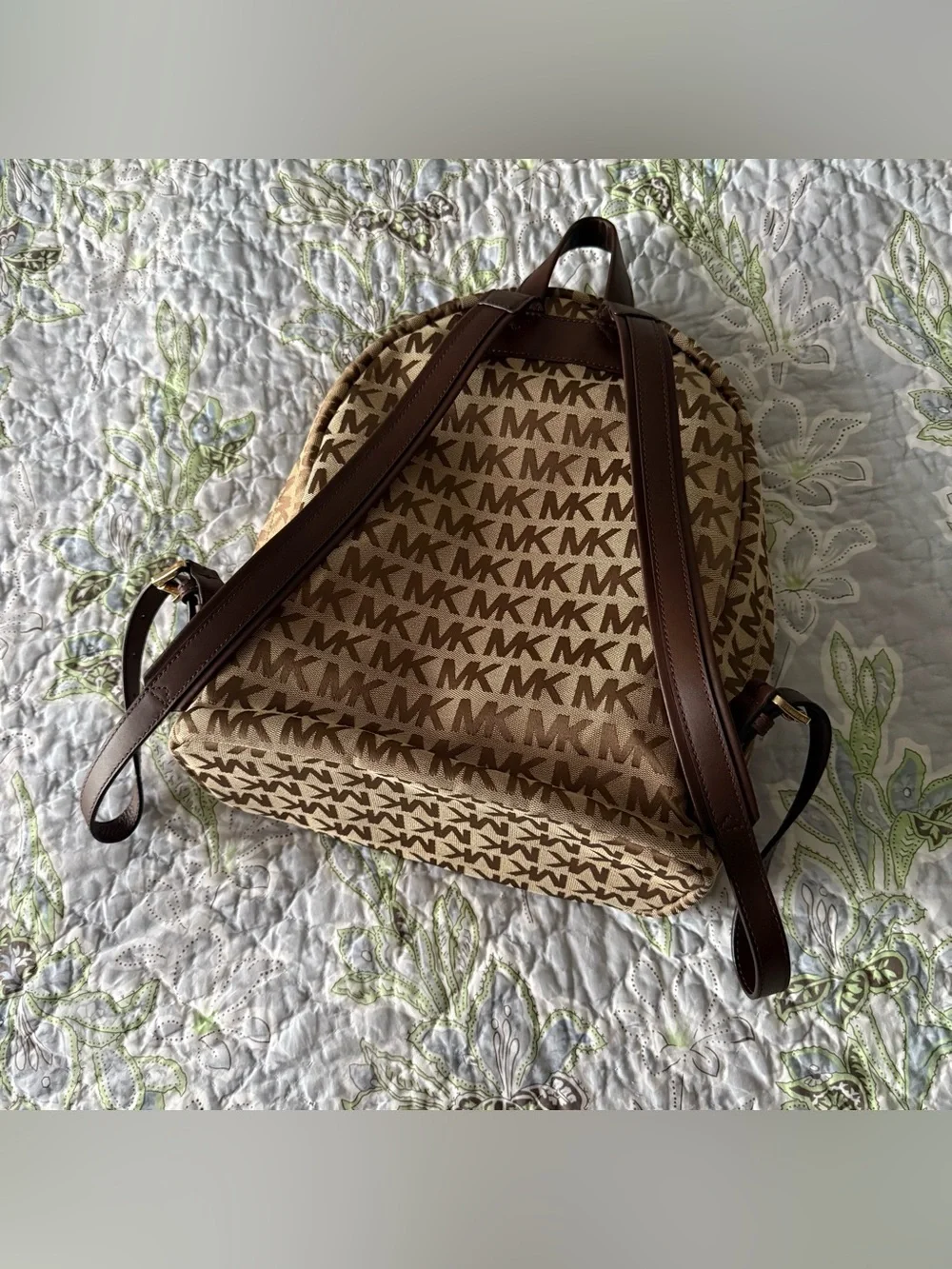 Michael Kors Monogram Logo Backpack with Gold Tone Hardware and Faux Leather Str
